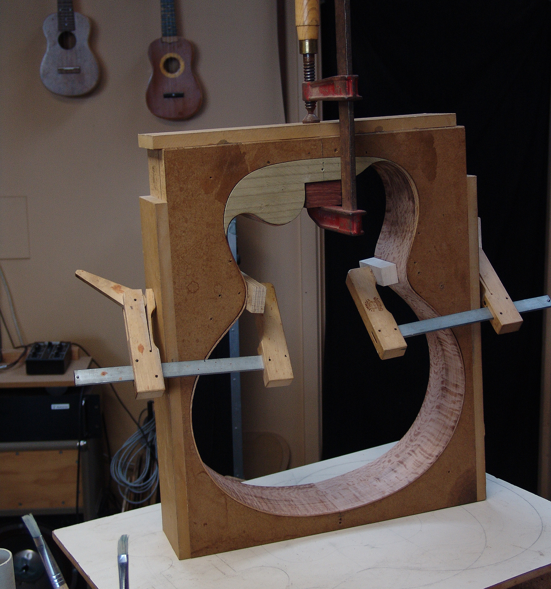 Guitar maker Peter Stephen uses an insert to shape his cutaway guitars