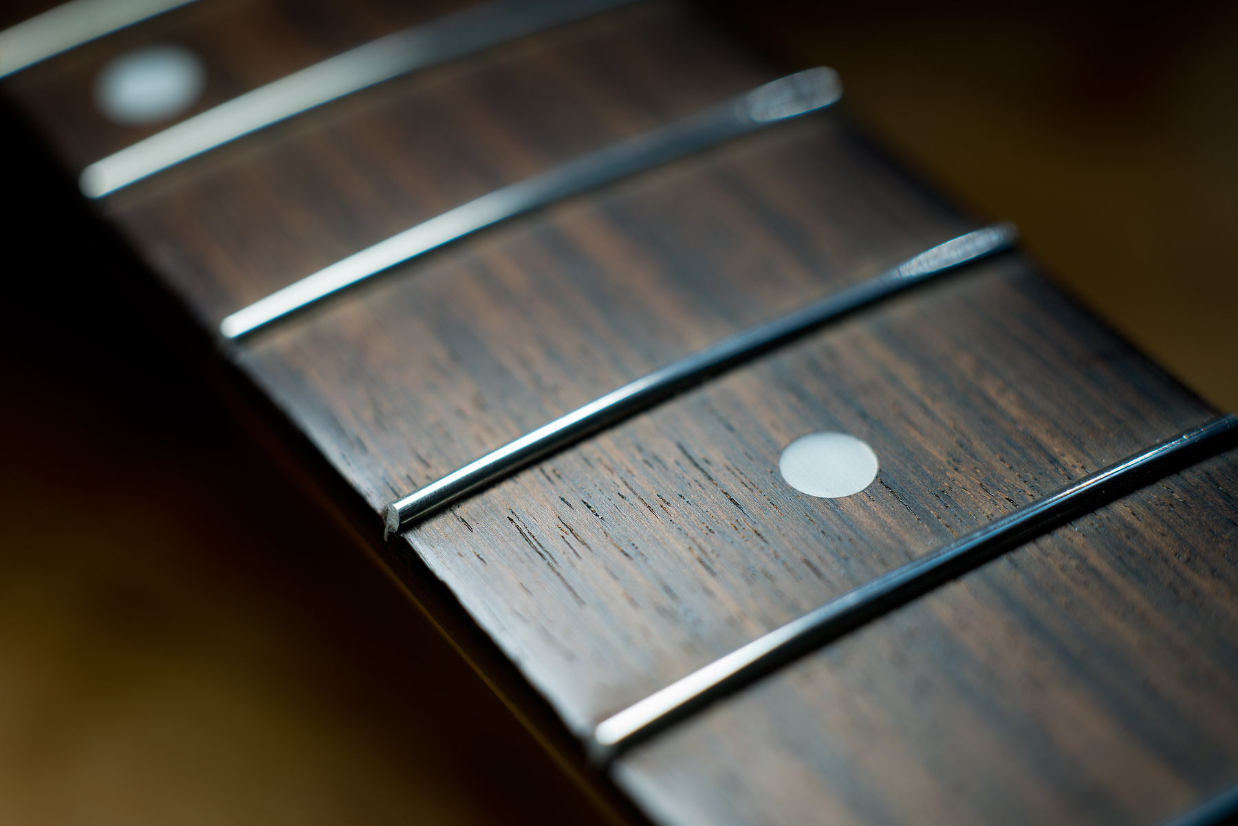 Guitar maker Peter Stephen's neck with pearl inlays