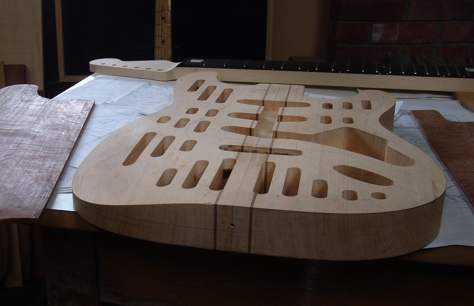 Guitar Maker Peter Stephen, solid body electric strat style guitar set out for assembly