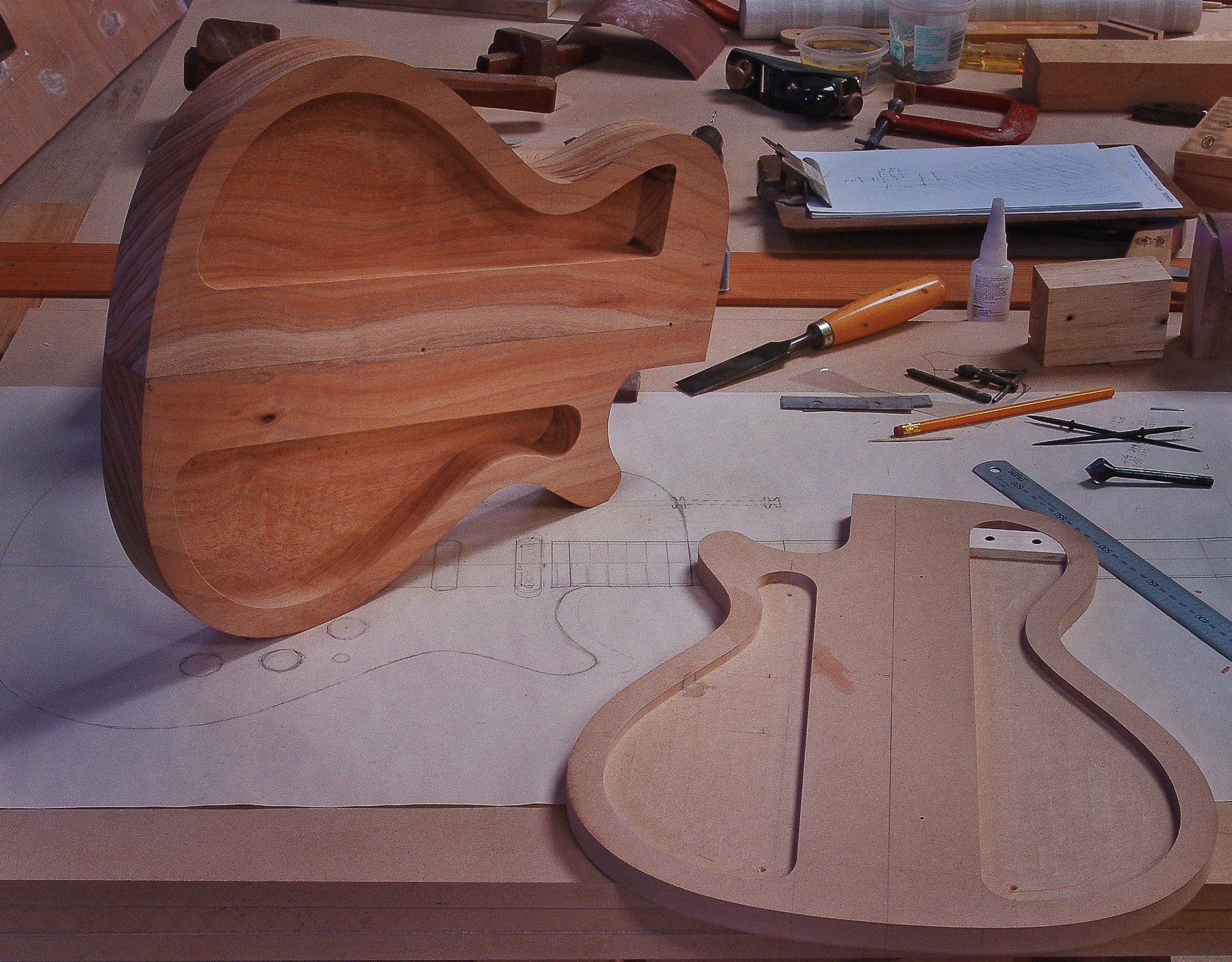 Luthier Peter Stephen, working on the soundboard of an electric solid body guitar
