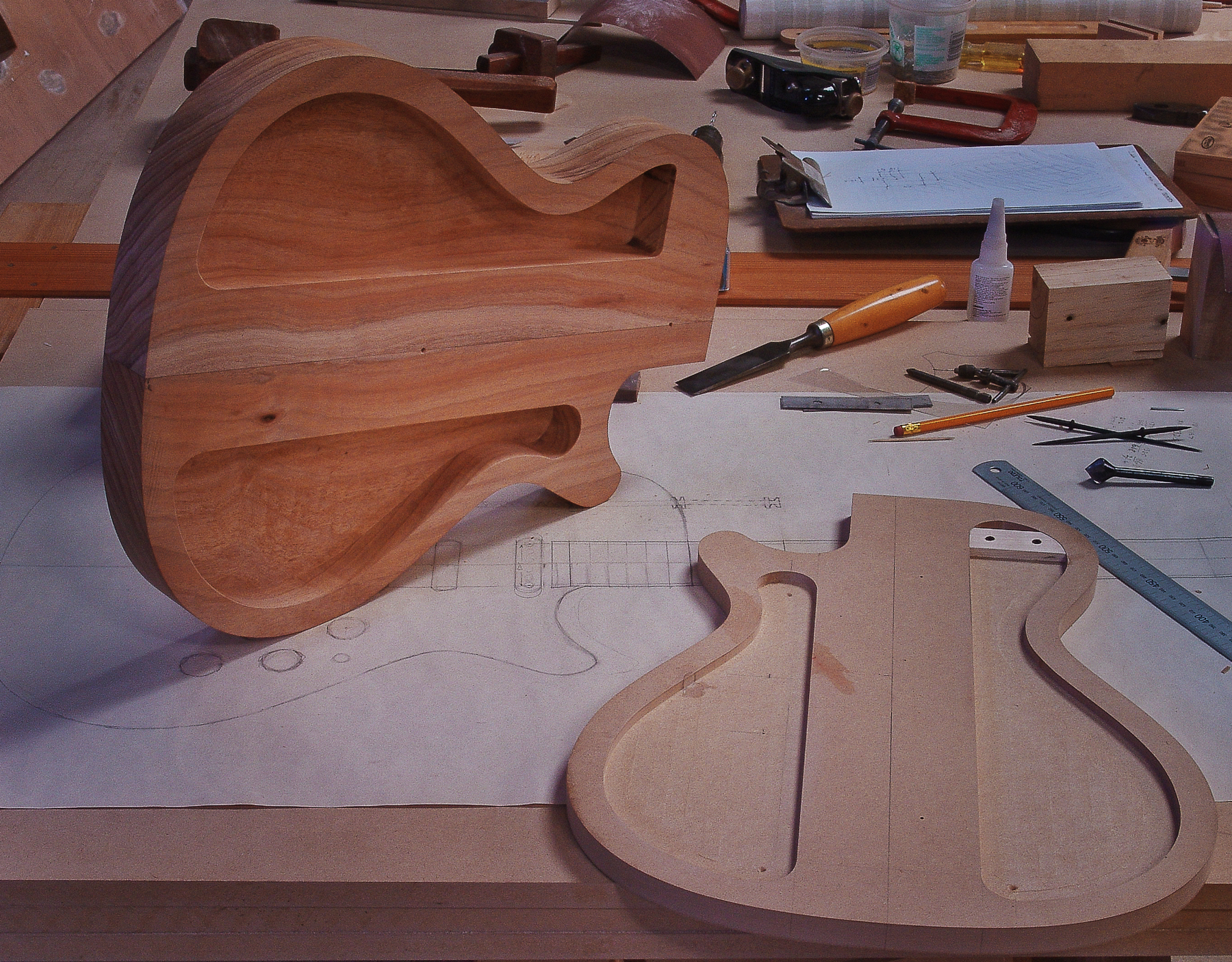 Guitar Maker Peter Stephen. Gibson Les Paul style electric solid body guitarbeing assembled 
