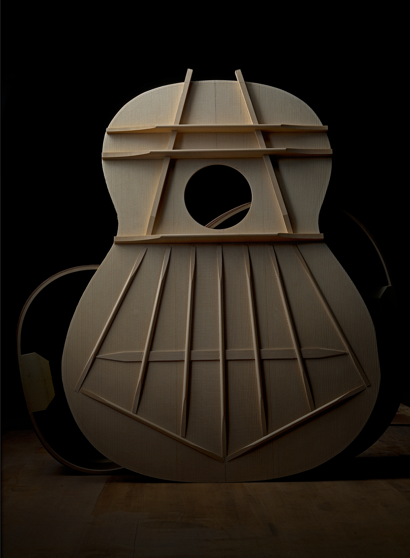 Luthier Peter Stephen construction of a double brace Spanish guitar soundboard